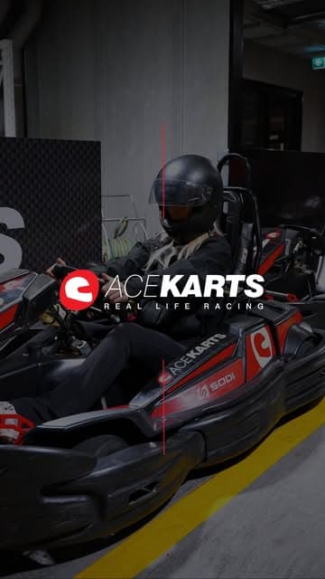 Ace Karts driver ready in the pit lane